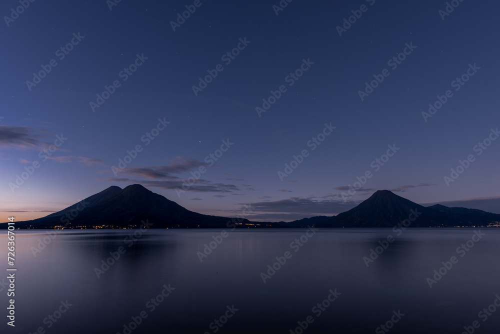 Atitlan Lake in Guatemala. Long Exposure Night Photo Shoot. Volcano in Background.Atitlan Lake in Guatemala. Long Exposure Night Photo Shoot. Volcano in Background.