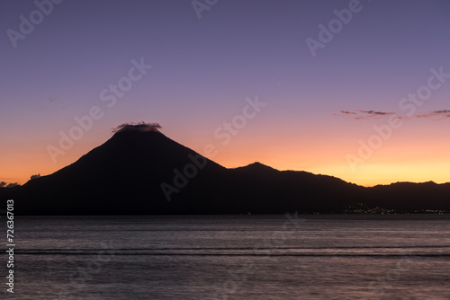Atitlan Lake in Guatemala. Long Exposure Night Photo Shoot. Volcano in Background. Lake Atitlan is the deepest lake in all of Central America with a maximum depth of about 340 meters or 1120 feet.