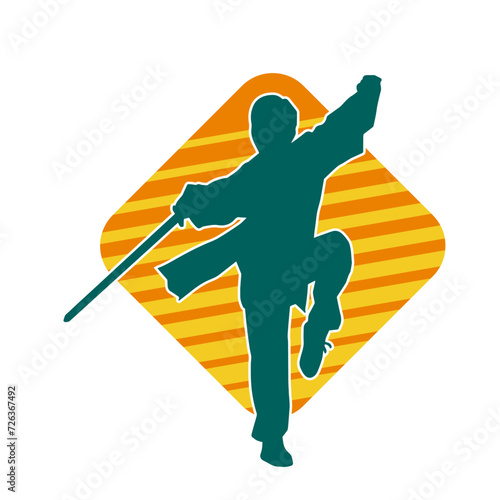 Silhouette of a male warrior in action pose with sword weapon. Silhouette of a man fighter carrying sword weapon.
