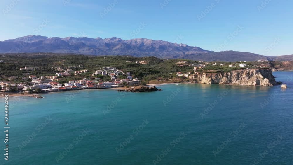 Crete, Greece. Aerial drone shot. Falassarna Beach in Chania, Elafonisi lagoon, Falassarna, Hills and town of Palaiokastro, Old christian church ruins in Crete, Katholiko Monastery greek landmark Crete, Greece. Aerial drone shot. Falassarna Beach in Chania, Elafonisi lagoon, Falassarna, Hills and town of Palaiokastro, Old christian church ruins in Crete, Katholiko Monastery greek landmark