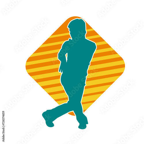 Silhouette of a man in oriental martial art pose. Silhouette of a male in martial art move.