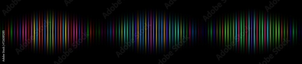 Abstract rainbow light trails on the dark background