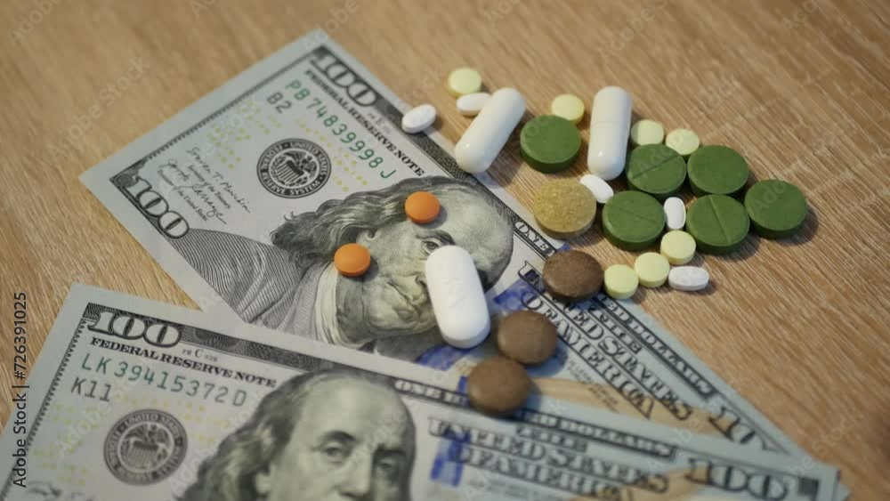 Money, finances and pills. The cost of medical drugs. The concept of finance and medicine. Medical pills cost dollars. Expensive drugs, pharmaceutical business. healthcare are very expensive.