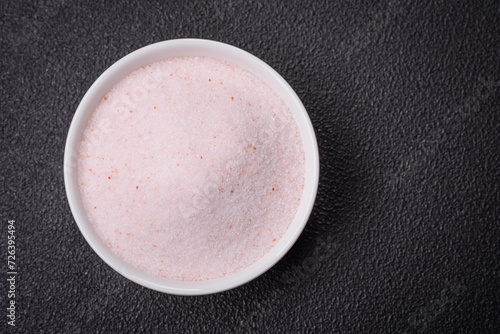 Fine pink Himalayan table salt in a ceramic bowl