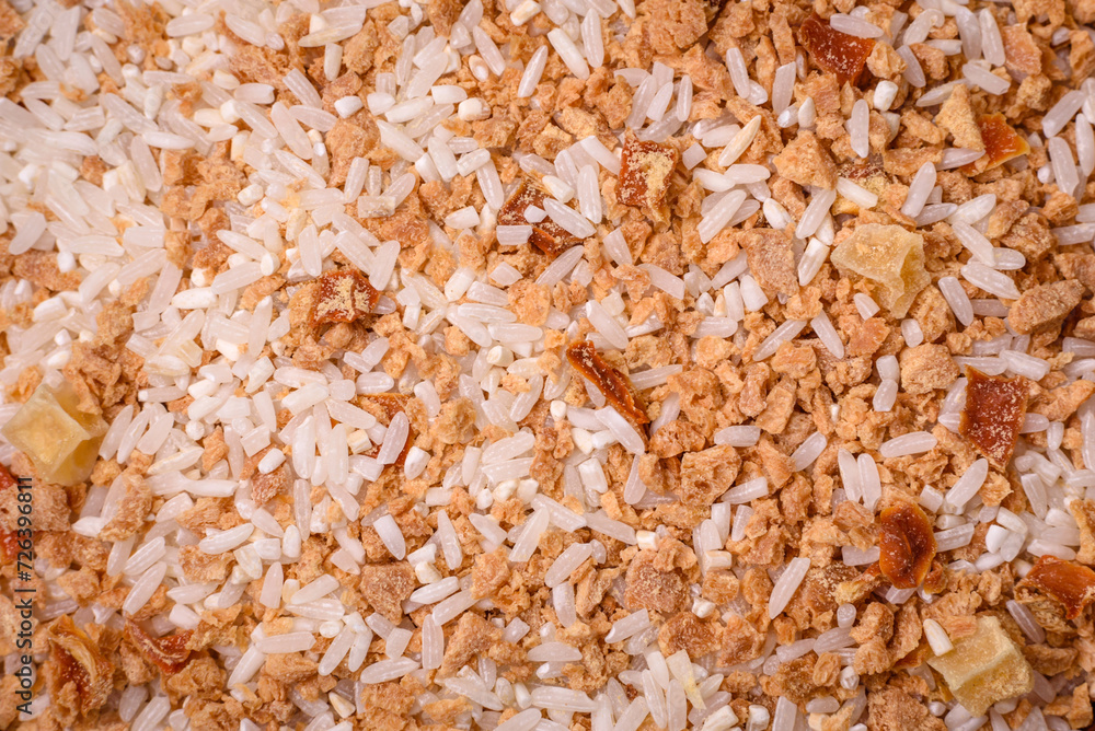 Large grains of uncooked white rice in a ceramic bowl Large grains of uncooked white rice in a ceramic bowl
