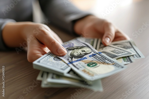 close up image of female hands holding several 100 dollar bills Generative AI