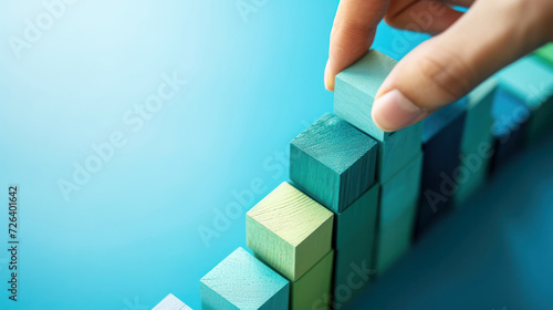 business growth success development process concept, close up hand arranging wood block stacking, background with copy space