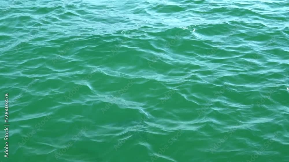 close up of small waves in the sea close up of small waves in the sea