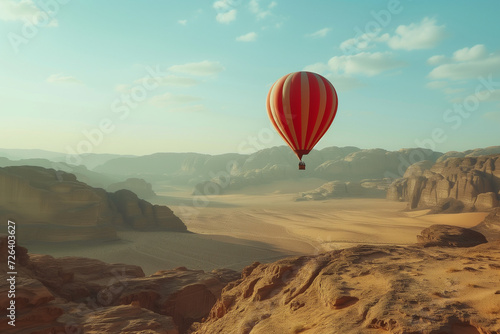 Hot air baloon flying over the Jordan desert with dunes and mountains, aerial top high view, day light