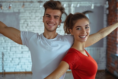 Young man and woman dancing in choreography class
