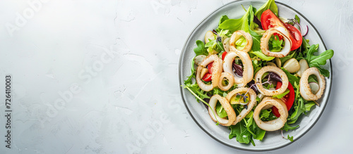 Salad with squid rings. Top view. Image for cafe menu, Banner