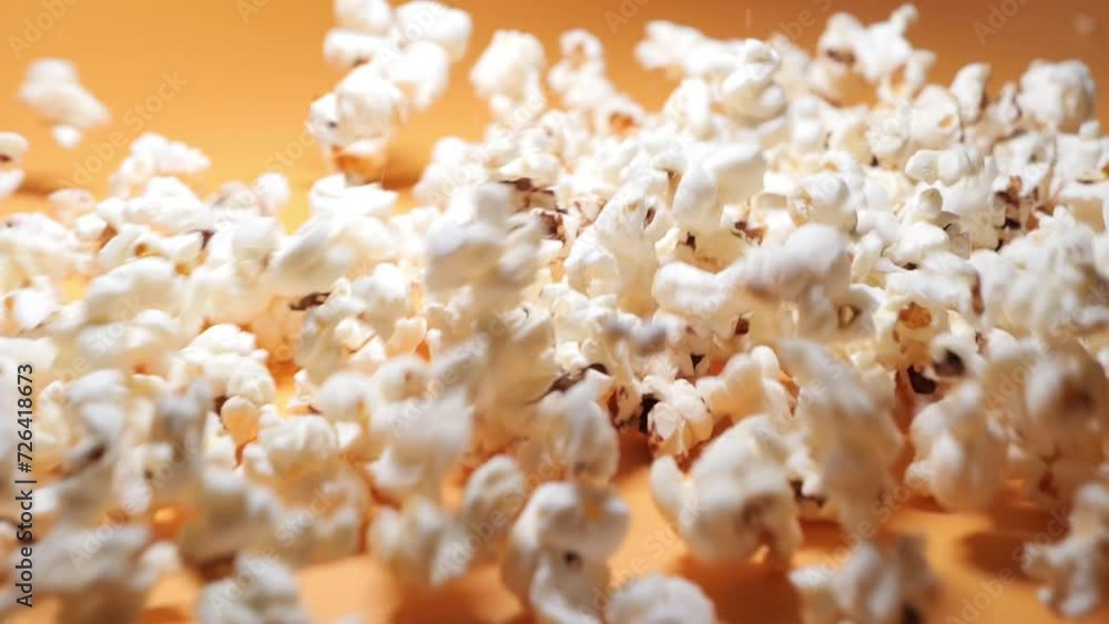 Sweet butter popcorn, close up,slow motion Sweet butter popcorn, close up,slow motion