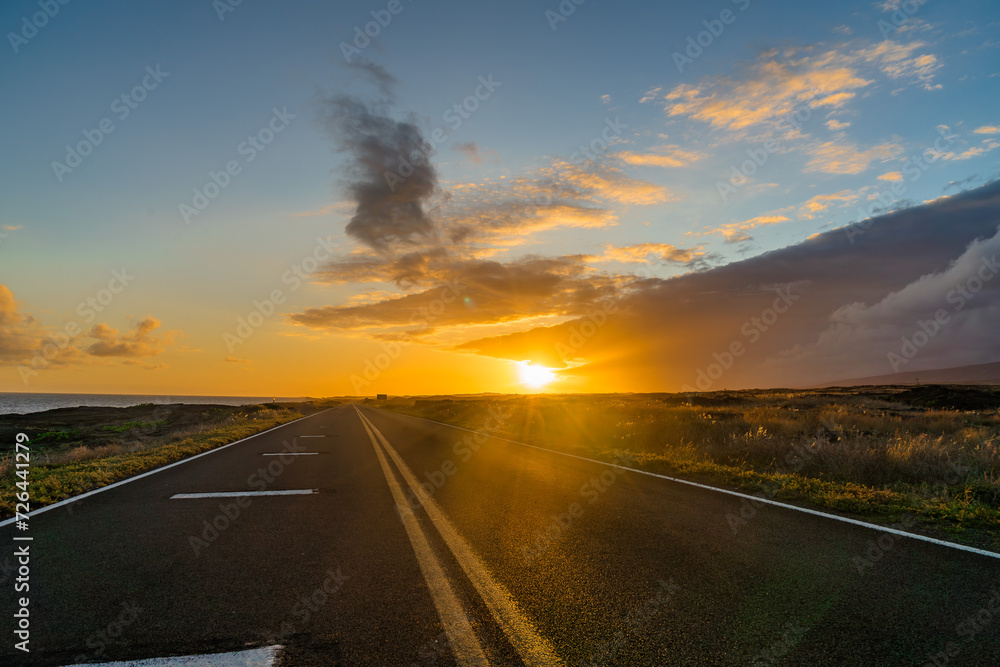 sunset on the road on the coast of the pacific on big island in hawaii sunset on the road on the coast of the pacific on big island in hawaii