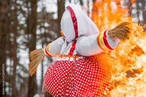Russian traditions. Shirokaya Maslenitsa holiday. Burning of an effigy of Maslenitsa in the Moscow region. Seeing off winter. photo
