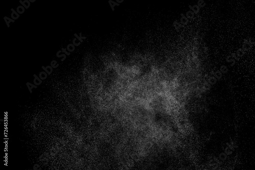 Smoke cloud. Abstract splashes of water on black background. White storm. Light overlay texture. 