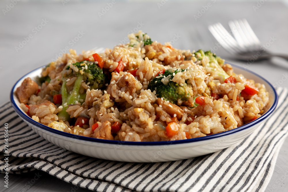 Homemade Chicken Teriyaki Fried Rice on a Plate, low angle view. Homemade Chicken Teriyaki Fried Rice on a Plate, low angle view.