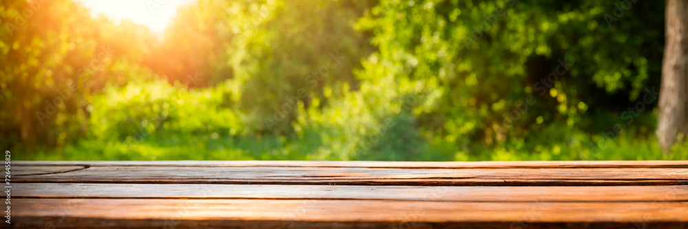 wooden table on the background of the garden. Selective focus. wooden table on the background of the garden. Selective focus.