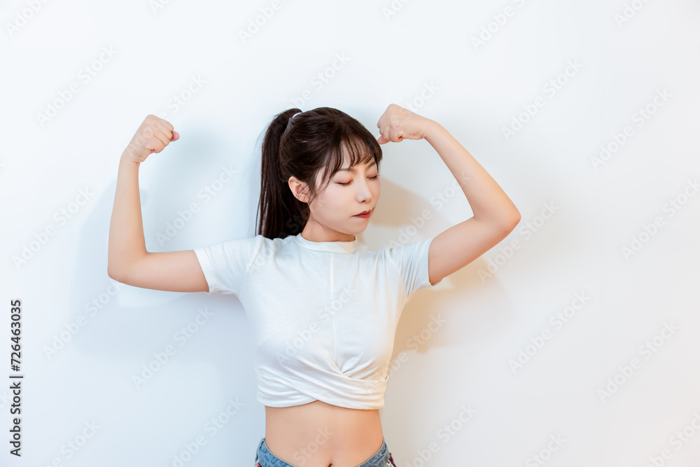 A girl in short sleeved shorts indoors A girl in short sleeved shorts indoors