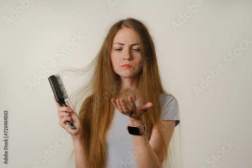 Woman is very upset because of hair loss