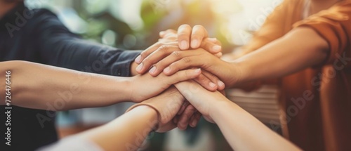 Team Unity Shown Through Stacked Hands photo