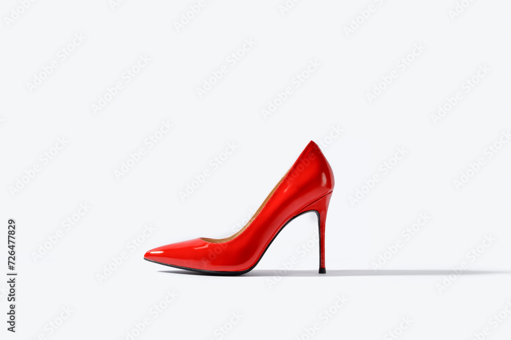Red high heel shoes on a white background. Red high heel shoes on a white background.