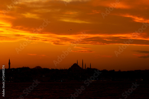 Silhouette of Suleymaniye Mosque and Istanbul at sunset