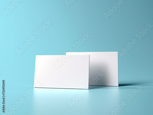 Two Blank White Business Cards on a Blue Background - Generative AI