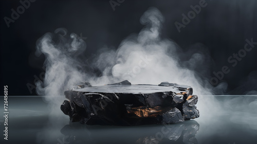 stone with smoke in the dark background