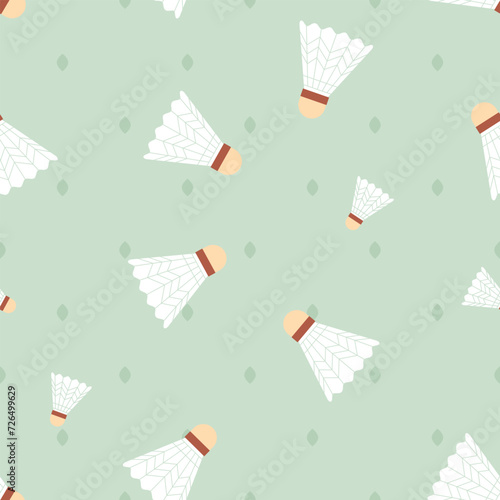 Seamless pattern with shuttlecocks and abstract leaves on green background. Retro illustration, summer graphic wallpaper with sport equipment. Vintage art. Badminton aesthetics. photo
