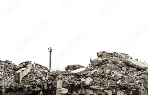 A pile of concrete fragments of a destroyed building made of bricks, piles, beams with the remains of a power line pole isolated on a white background. Background