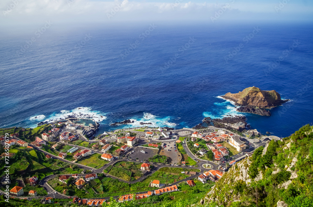 Aerial view of Porto Moniz town, Natural volcanic lava pools in
Madeira island. Travel concept