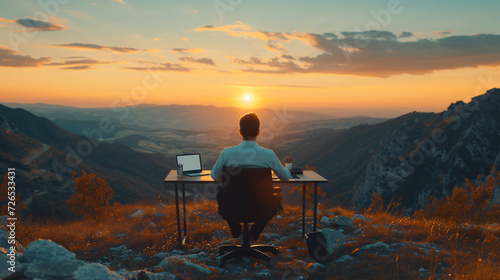 Work from travel, A Man in office clothes sitting and working on the Mountain photo