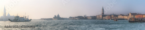 Venice, Italy is open air architectural museum with canals, gondolas, bridges, buildings. Panorama