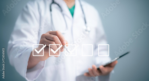 Check list concept.Medical worker with online checklist survey, filling out digital form checklist, take an assessment, questionnaire, evaluation, online survey, online exam photo