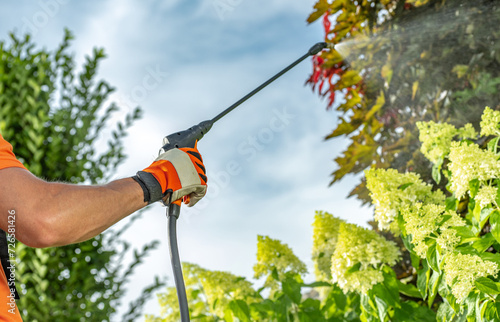 Garden Worker Insecticide Backyard Trees © Tomasz Zajda