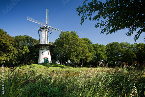 Molen De Hoop in het stadje Tholen is een stellingmolen uit 1736. De molen staat aan het water van de oude stadsomgrachting aan een wandelpad  photo