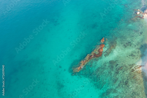 Aerial view reefs in the waters of a tropical lagoon.