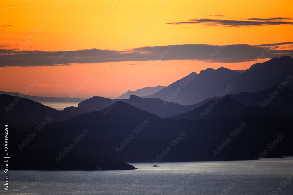 Silhouettes of Elaphiti Islands at sunset, dubravka viewpoint, dubrovnik, croatia, 2023, horizontal format