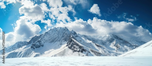 High mountain with withe snow and blue sky landscape. AI generated image