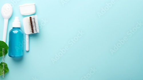 Mouthwash and other oral hygiene products on colored table top view with copy space. Flat lay. Dental hygiene. Oral care kit. Dentist concept
