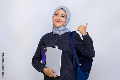 Muslim woman on college student outfit concept.
 photo