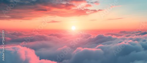 sunrise time above the clouds