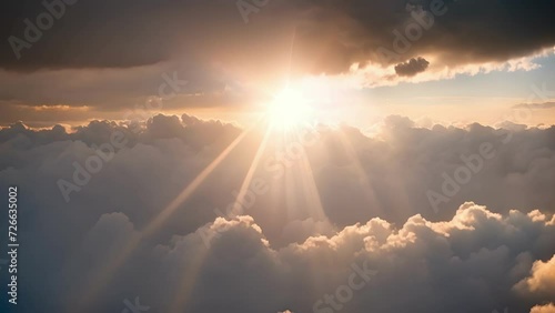 A glimpse of heaven as crepuscular rays shine through the clouds. photo