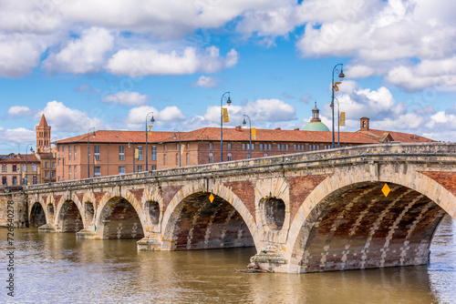 Scenic view of old bridge in Toulouse against spring dramatic sky  © Horia Merla