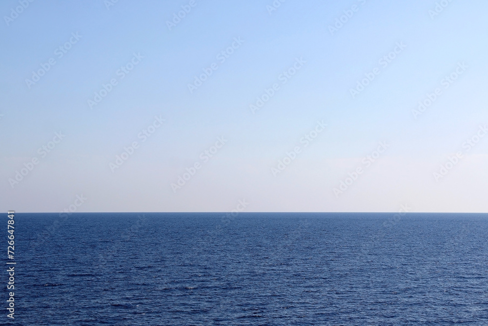 Bright blue sea and clear sky. Copy space. Bright blue sea and clear sky. Copy space.