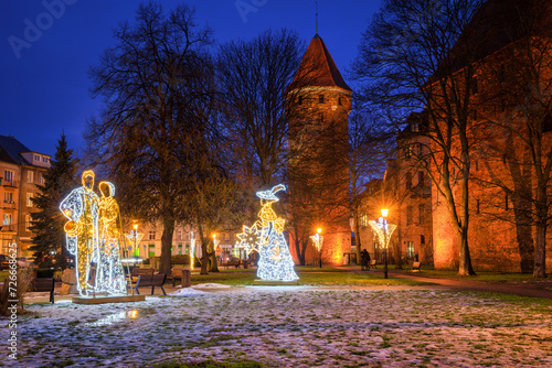 Christmas illuminations in a winter park in the old town of Gdansk, Poland