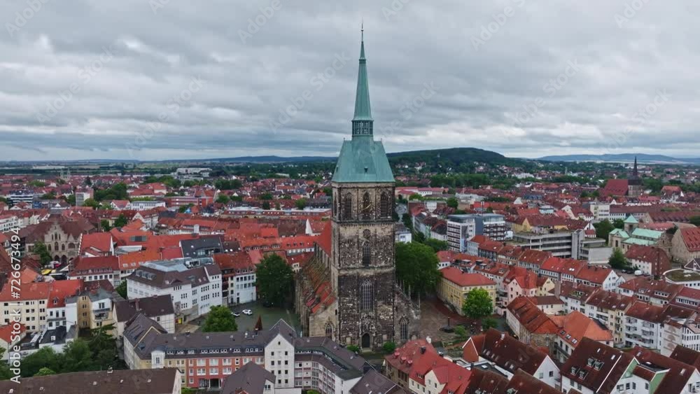 Aerial Drone view of The church of St. Andreas or Andreaskirche , it is the principal Lutheran church of Hildesheim, Germany. Its is the tallest church tower in Lower Saxony Aerial Drone view of The church of St. Andreas or Andreaskirche , it is the principal Lutheran church of Hildesheim, Germany. Its is the tallest church tower in Lower Saxony