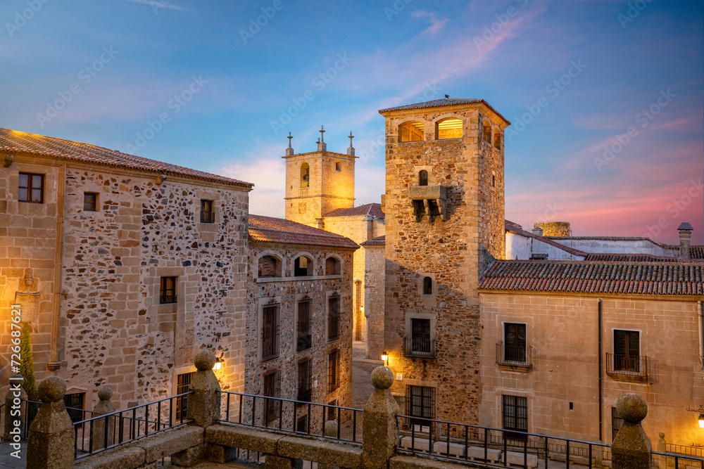View of the Plaza de San Jorge, with the Tower of the Los Golfines de Abajo palace as the protagonist, in Cáceres, Extremadura, Spain, a city declared a world heritage site by UNESCO View of the Plaza de San Jorge, with the Tower of the Los Golfines de Abajo palace as the protagonist, in Cáceres, Extremadura, Spain, a city declared a world heritage site by UNESCO