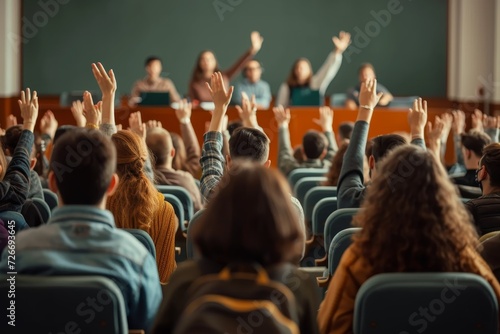 In a sea of diverse clothing and human faces, a group of people eagerly raise their hands in a conference hall, united in their desire to learn and connect at the seminar