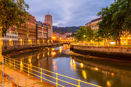 Nervion River in Bilbao Spain at Dusk photo